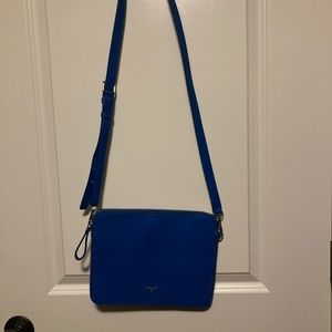 TUMI crossbody purse/tablet bag- never used